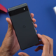 A screenshot of a person holding the Pixel 6a